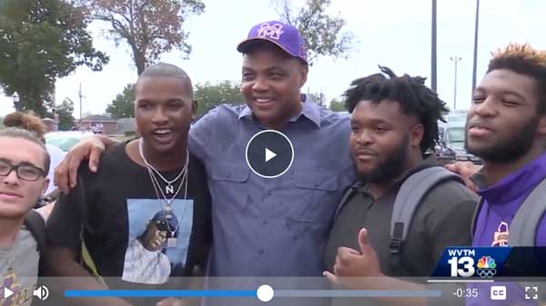 charles barkely with students at Miles